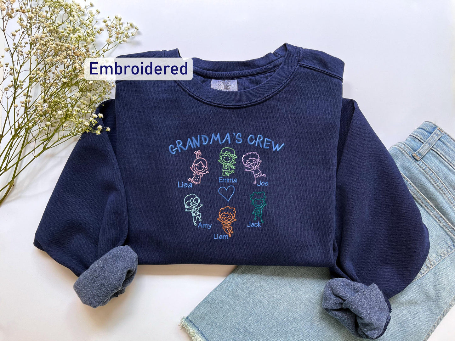 a child's shirt with the words grandma's crew on it