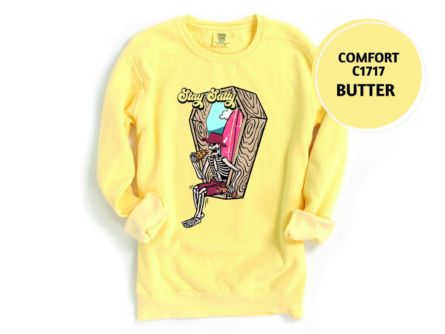 a yellow sweatshirt with a cartoon character on it