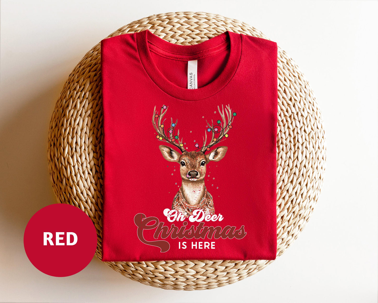 a red t - shirt with a deer on it
