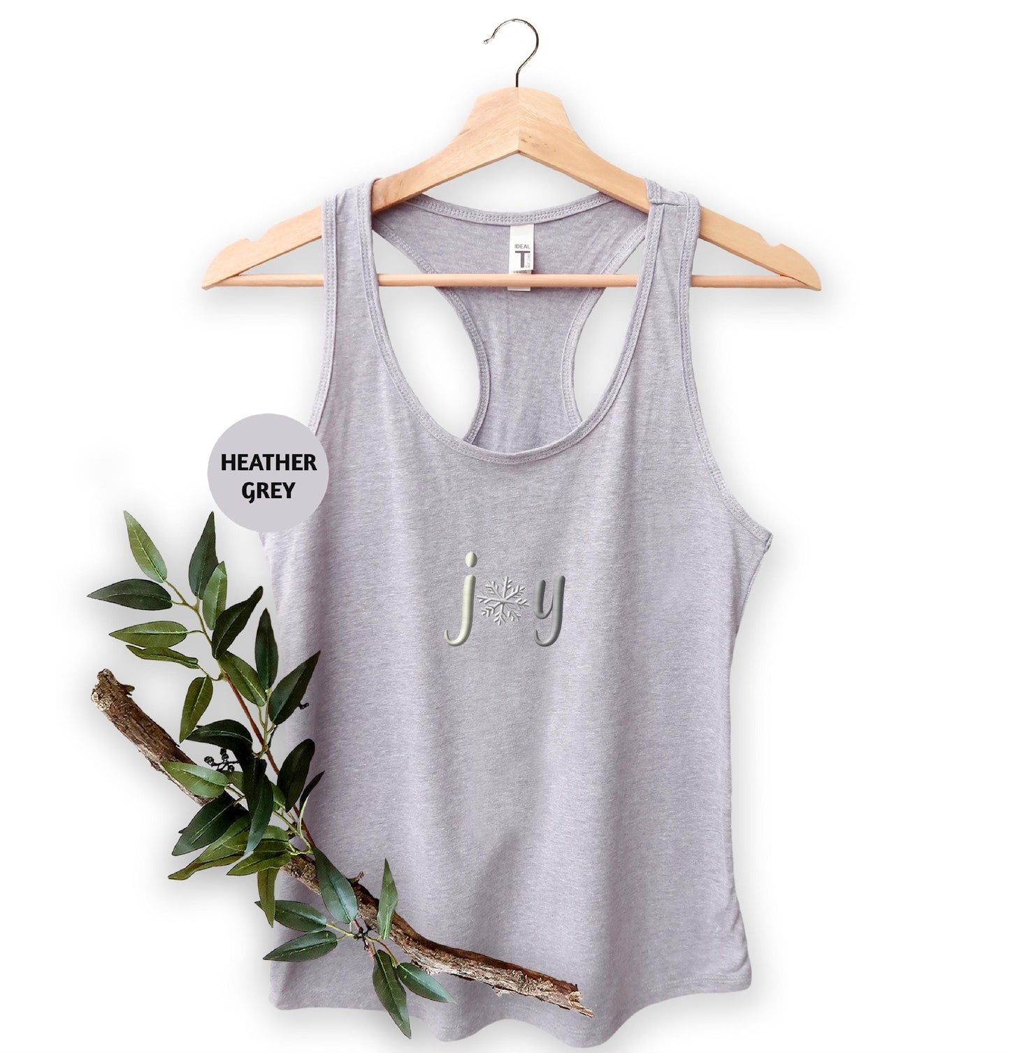 a women's tank top with the word joy printed on it