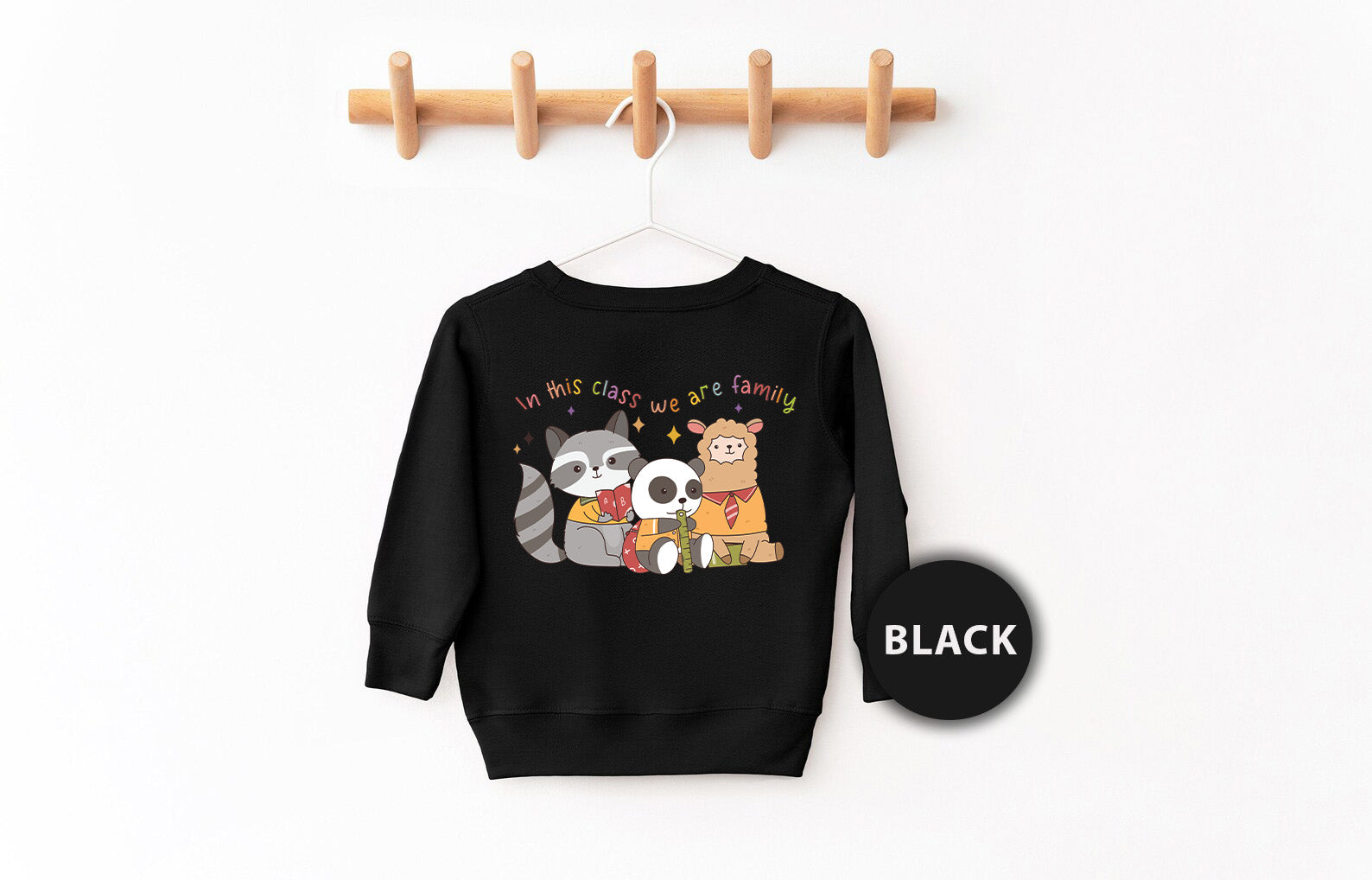 a black sweatshirt with a panda bear and panda bear on it