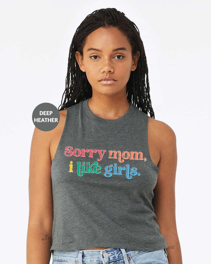 a woman wearing a tank top that says sorry mom, i like girls