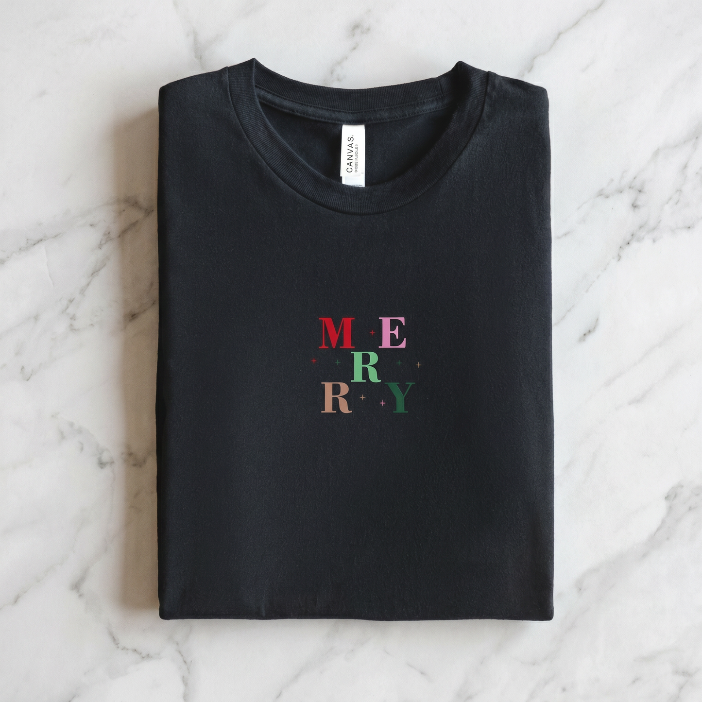 A black t-shirt with the text "MERRY Y" printed on it.