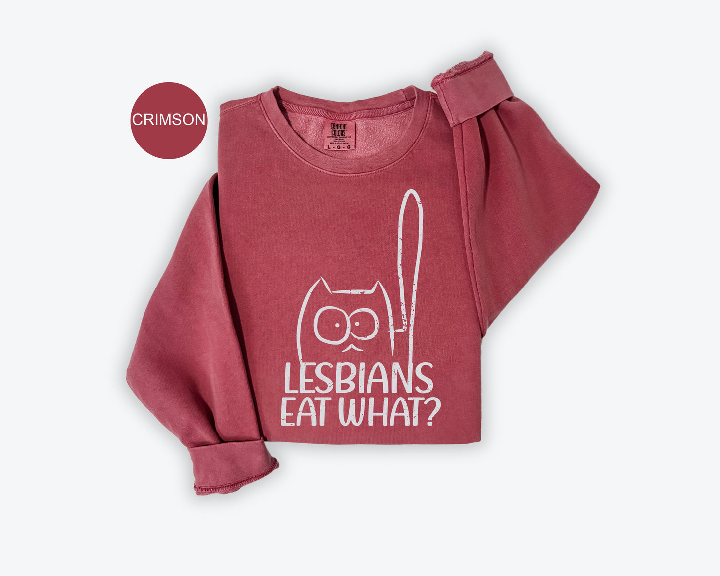 a red shirt with the words lesbians eat what? on it