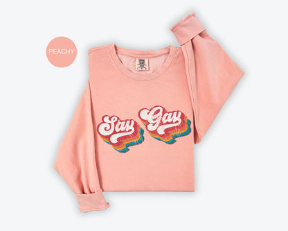 a pink shirt with the words stay gay on it