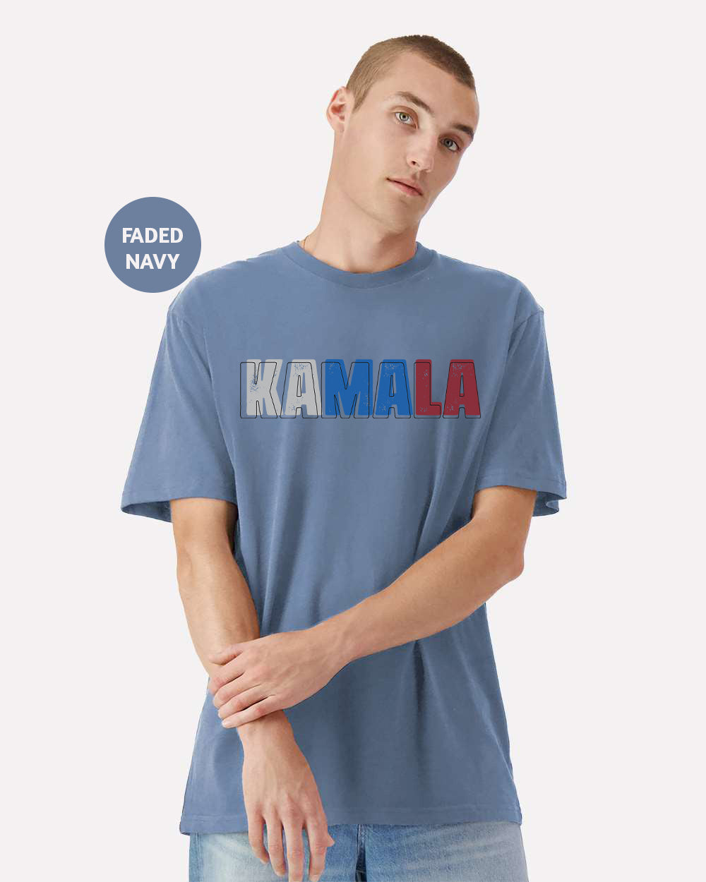 a man wearing a blue shirt with the word kaamala printed on it