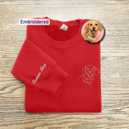 a red shirt with a picture of a dog on it