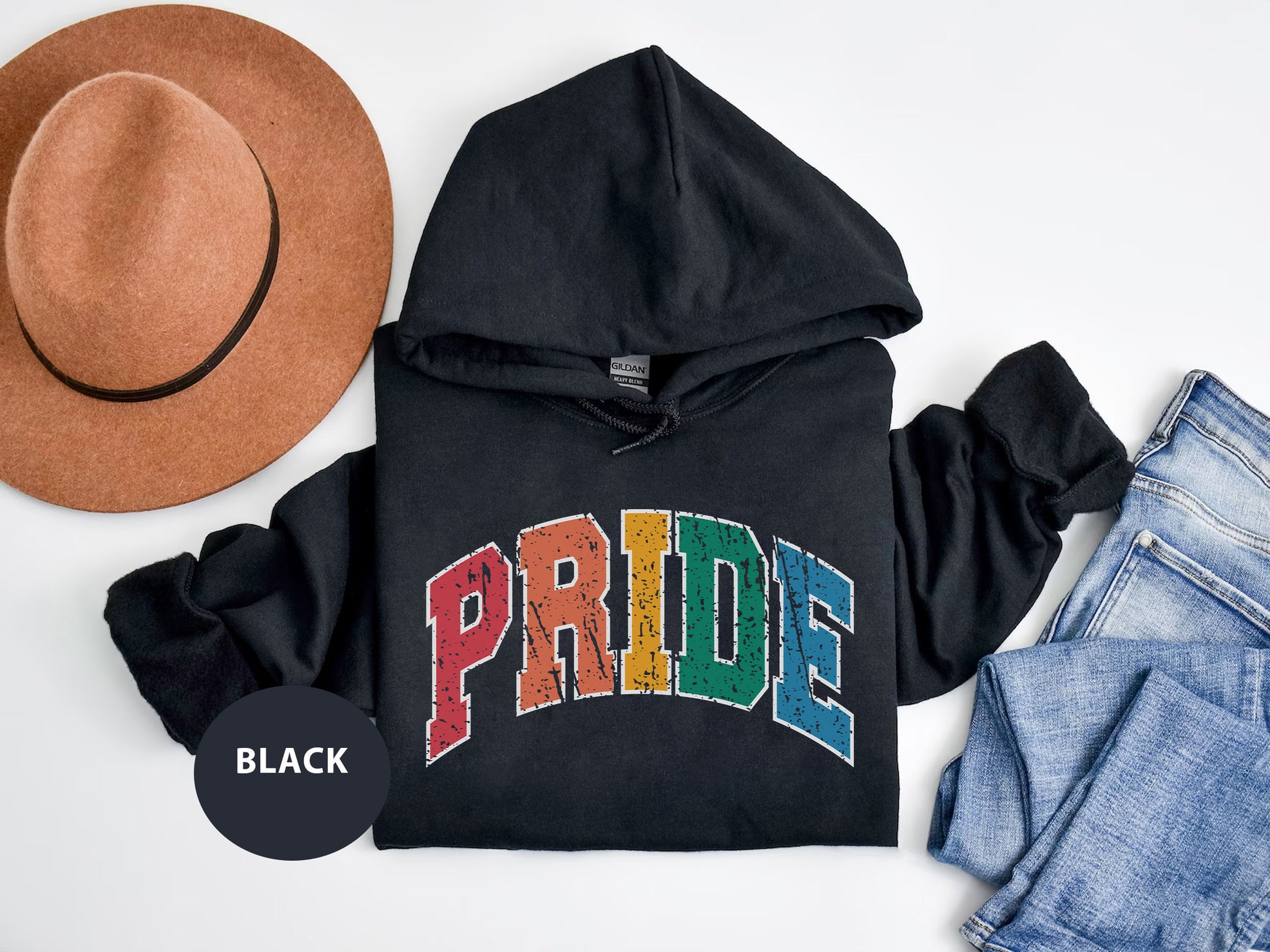 a black hoodie with the word pride printed on it