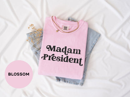 a pink shirt that says madam president on it