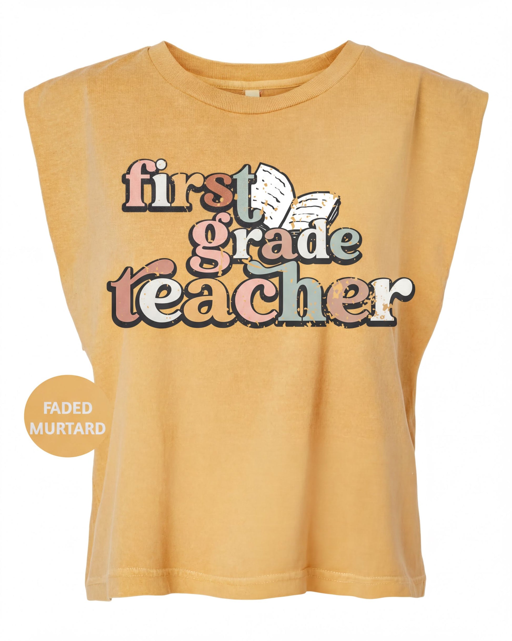 A yellow t-shirt with the text "first grade teacher" printed on it.