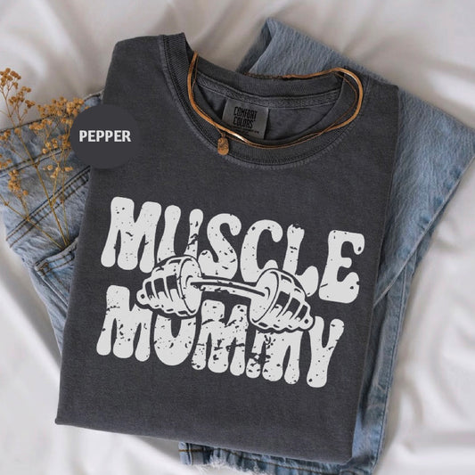 a t - shirt that says muscle muffin on it