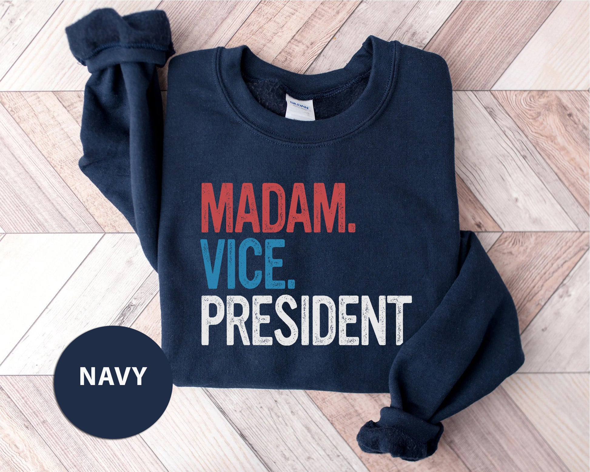 a navy sweatshirt with the words madam vice president on it