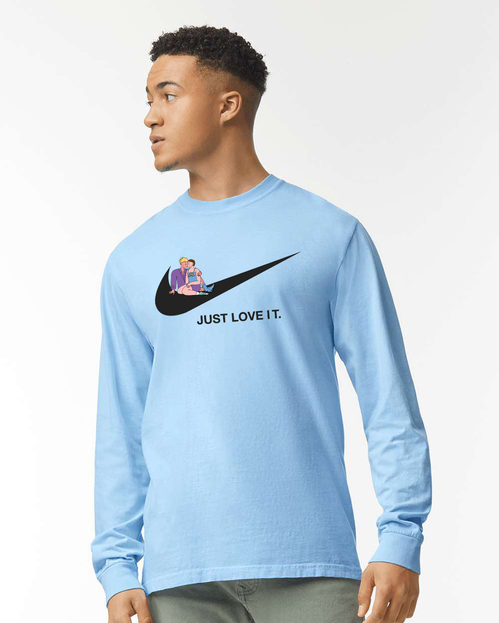 a man wearing a blue nike t - shirt that says just love it