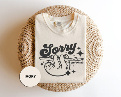 a white t - shirt with the words sorry on it