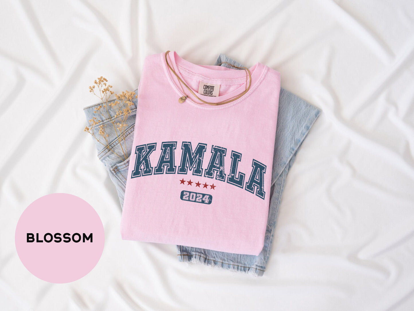 a pink shirt with the word kalamal written on it