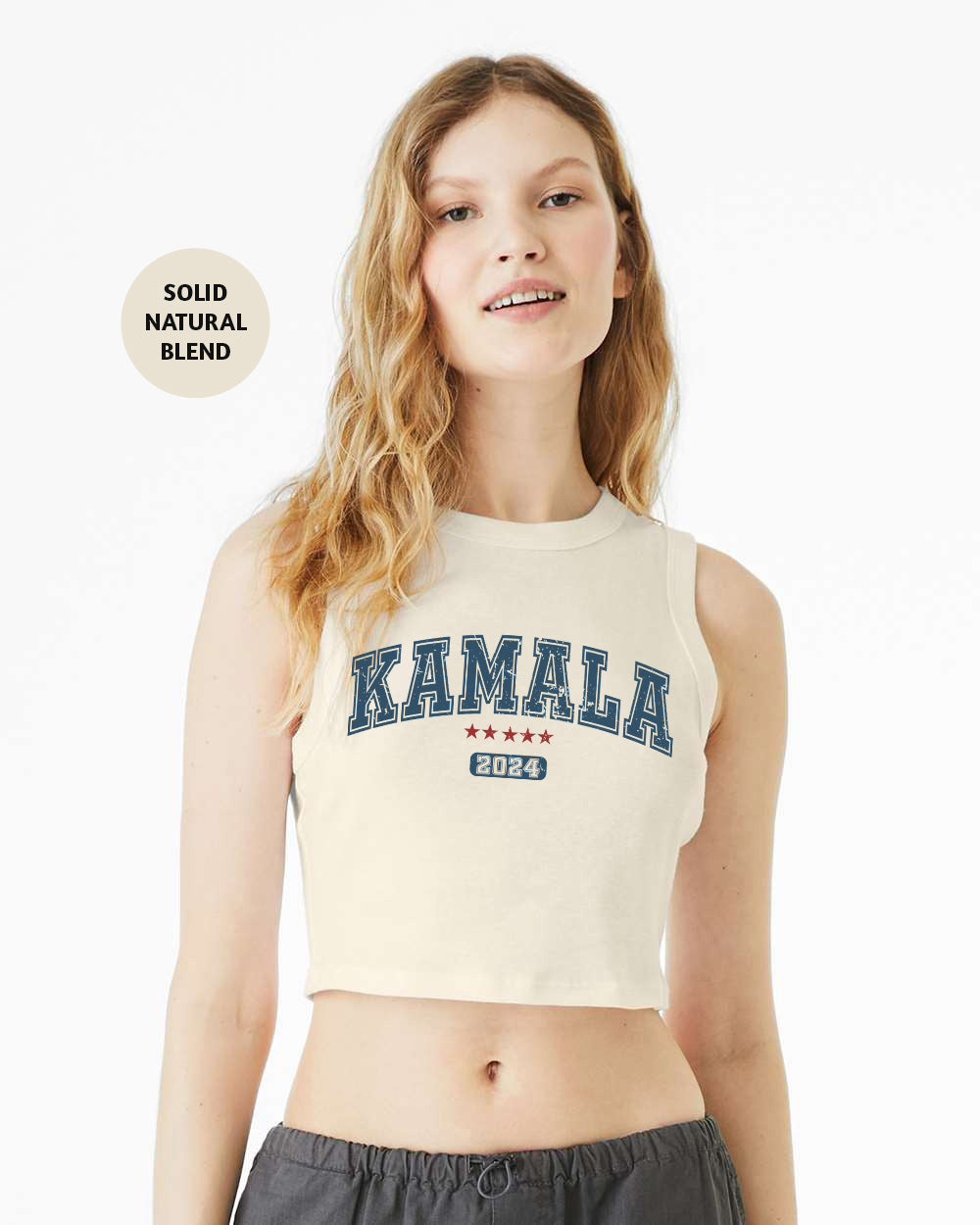 a woman wearing a white crop top with the word kalamala printed on it