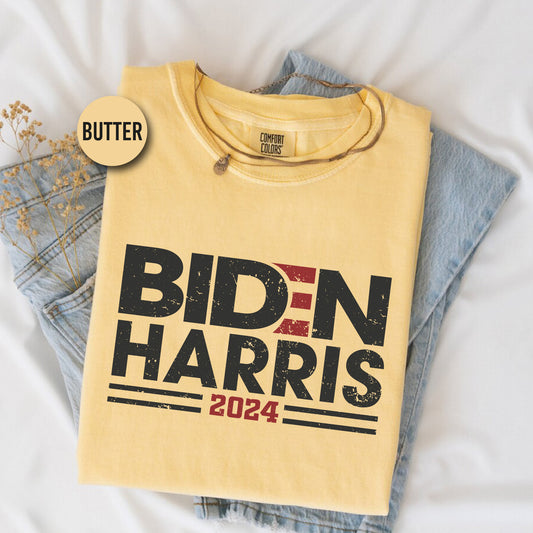 a t - shirt that says bidn harris next to a pair of