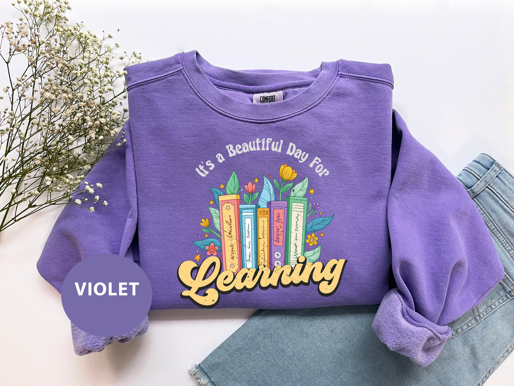 a purple shirt with the words learning printed on it