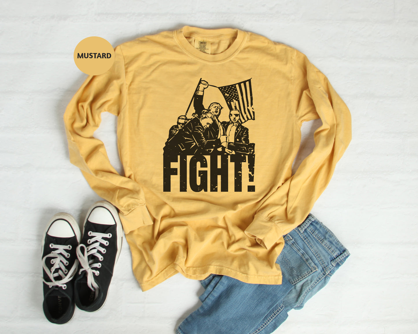 a t - shirt that says fight with a picture of a man holding a flag