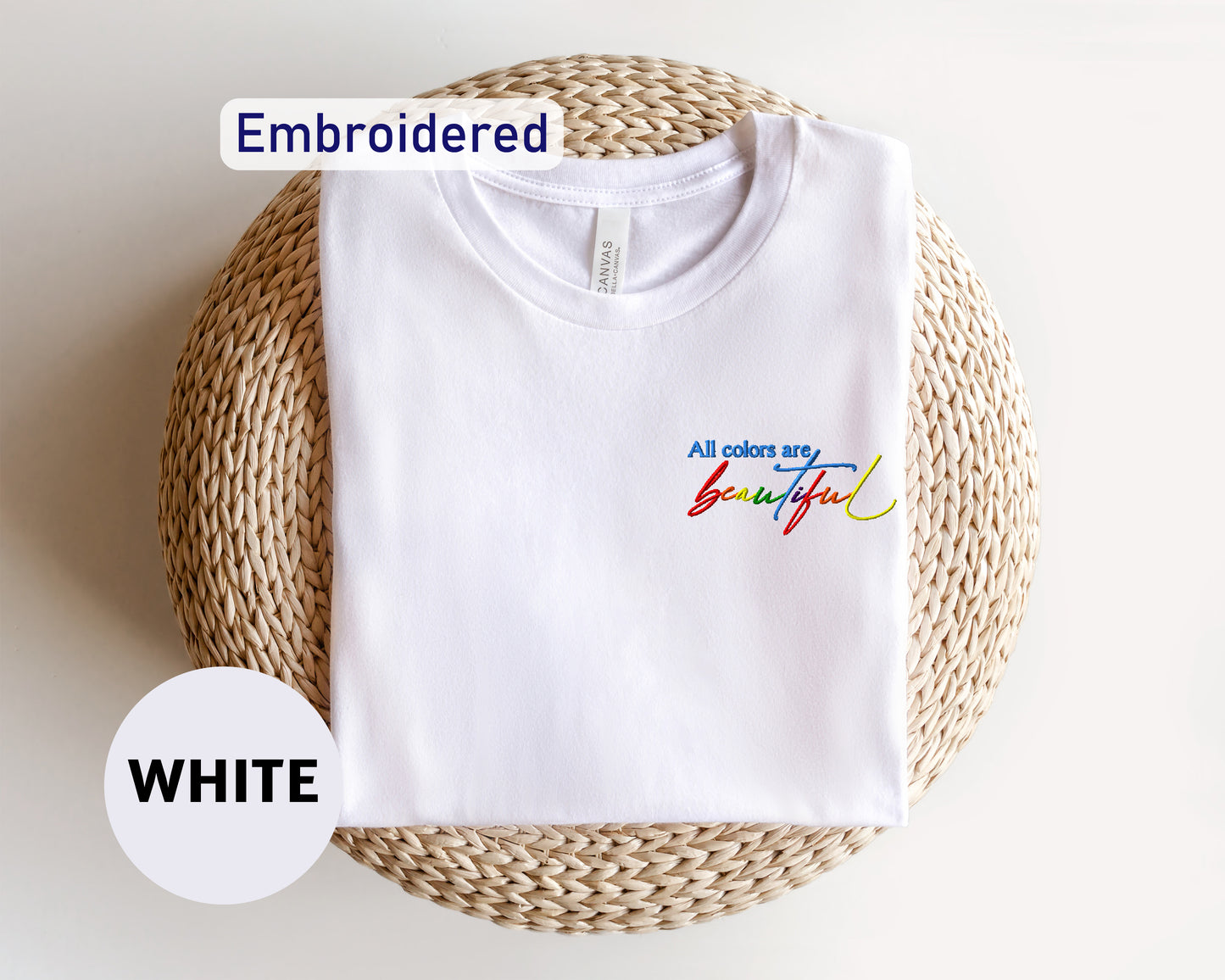 a white t - shirt with the words embroidered on it