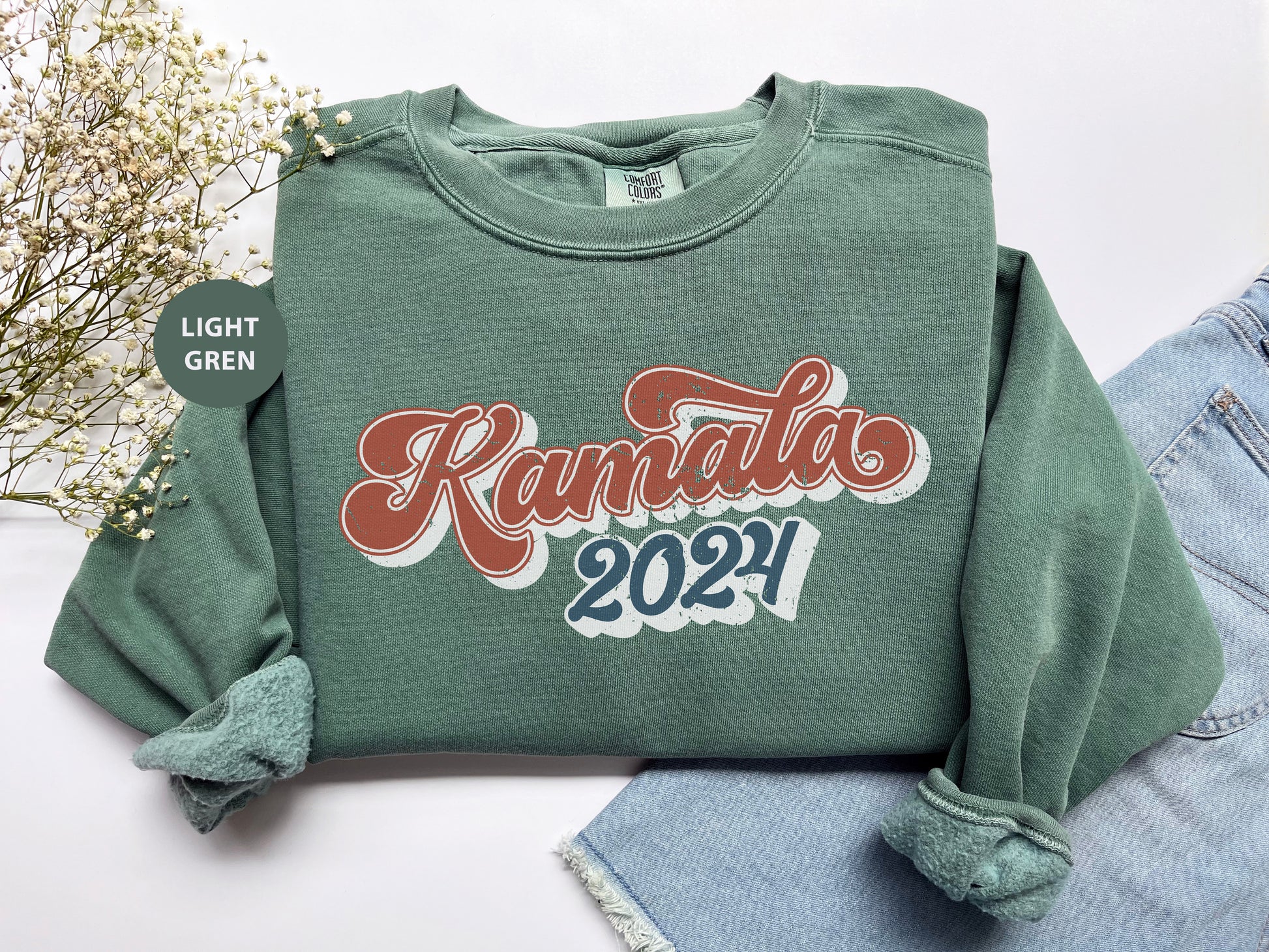 a green sweatshirt with the words ramada's on it