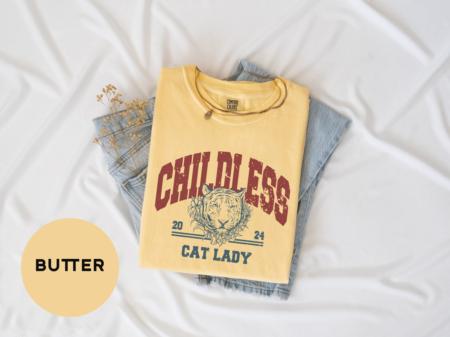 a yellow shirt with a cat lady on it