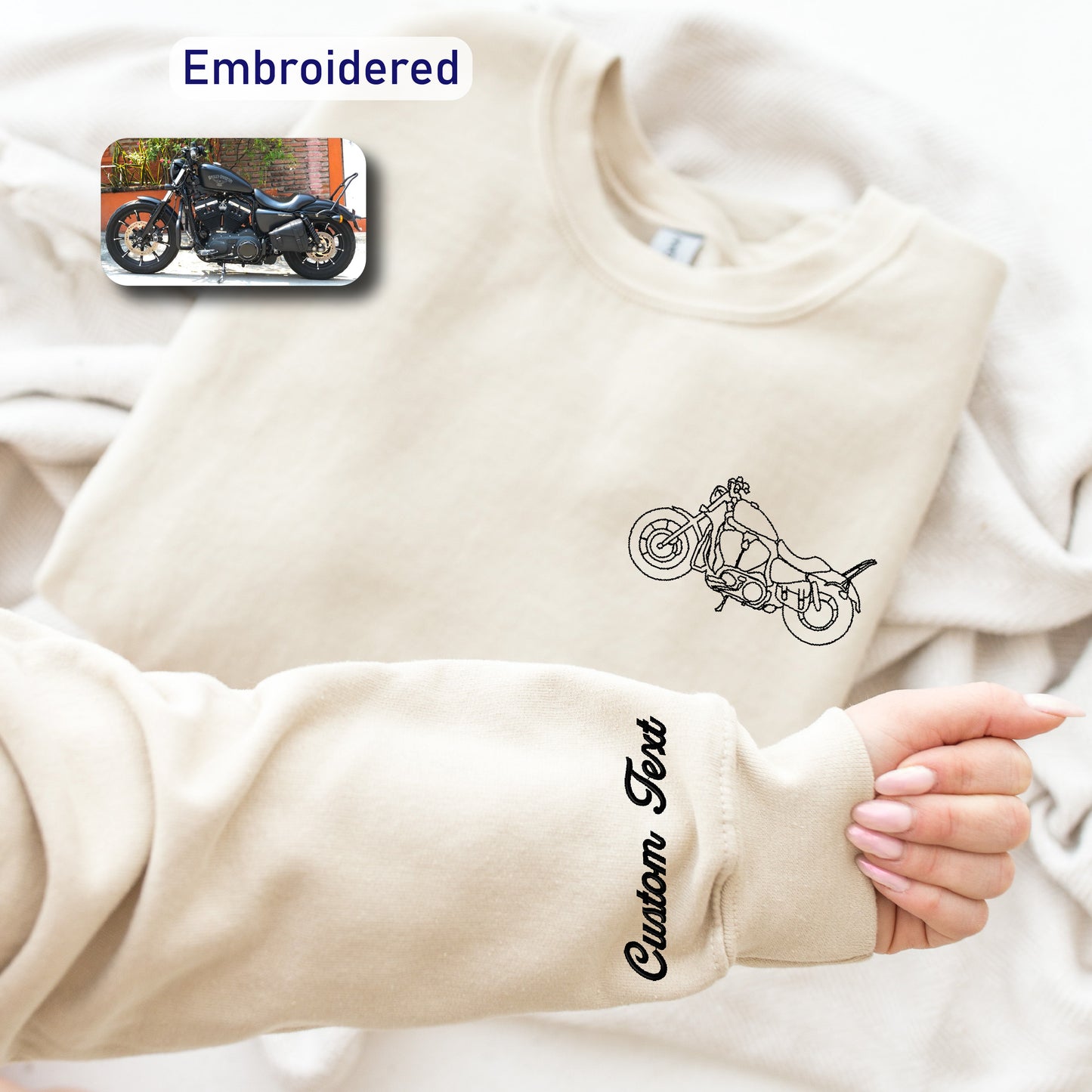 a person wearing a sweater with a motorcycle drawn on it