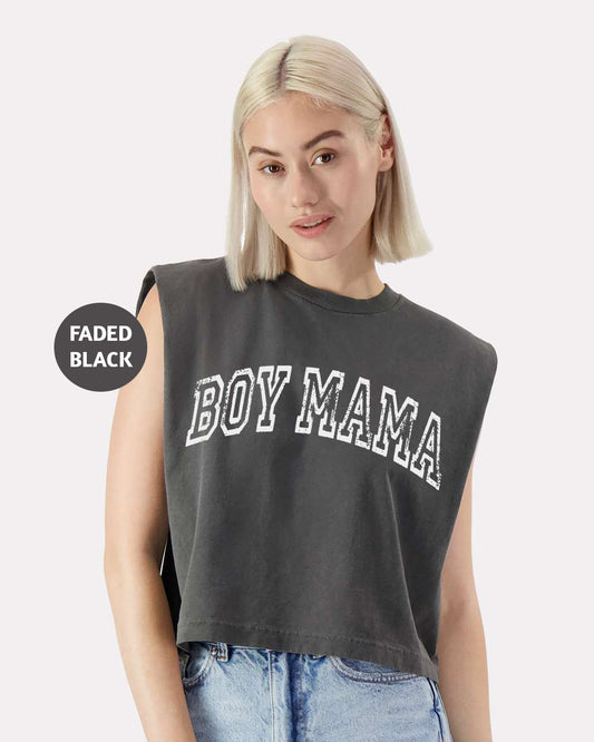 a woman wearing a cropped crop top with the word boy mama printed on it