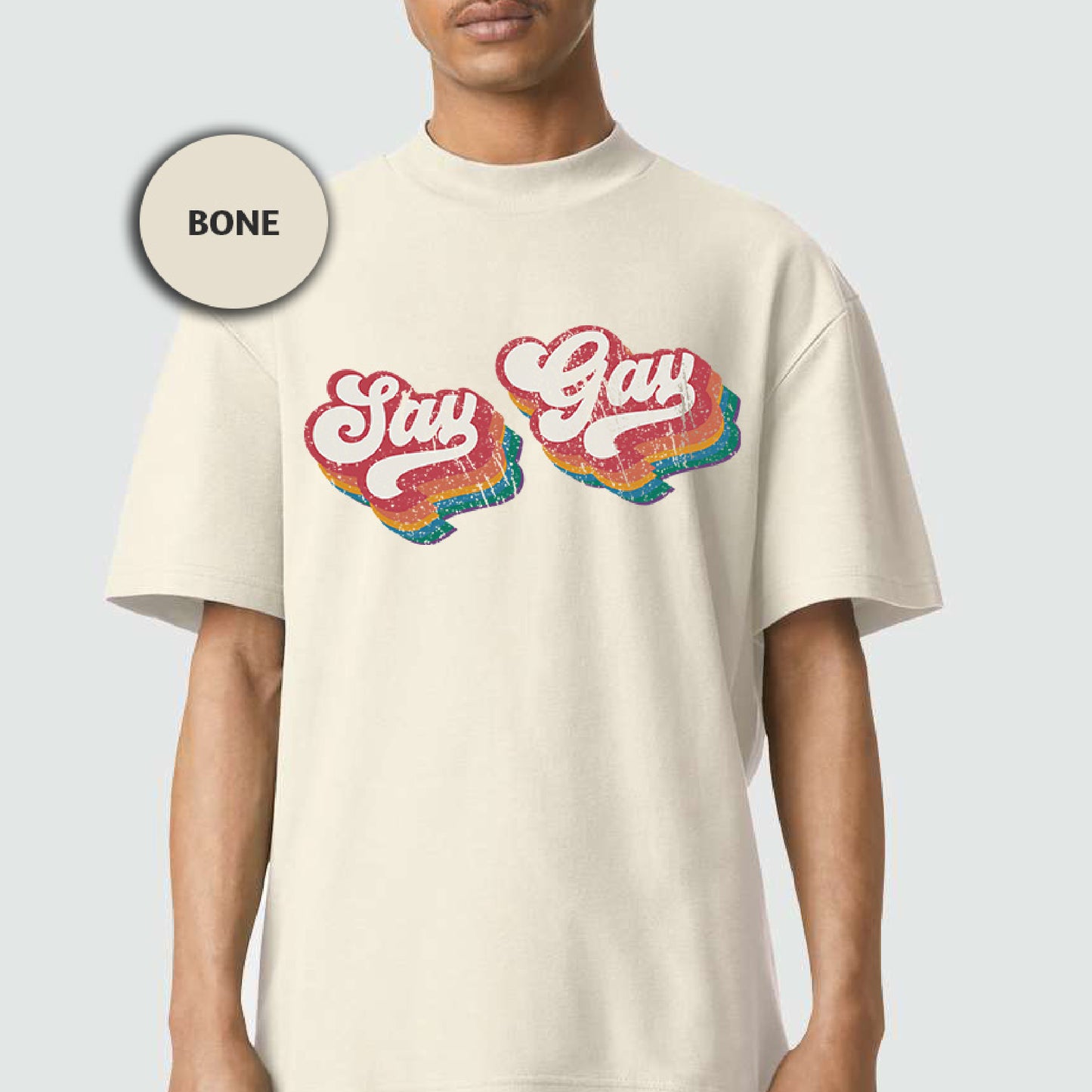 a man wearing a white t - shirt with the words stay gay on it