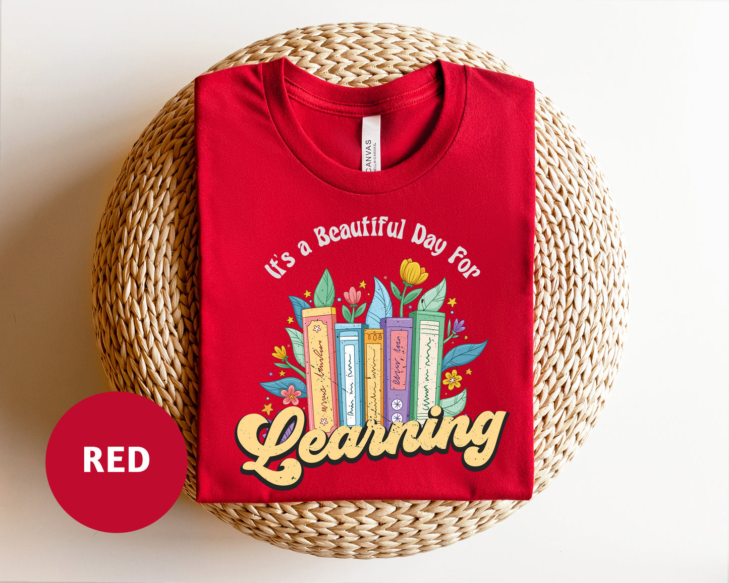 a red t - shirt that says it's a beautiful day to be learning