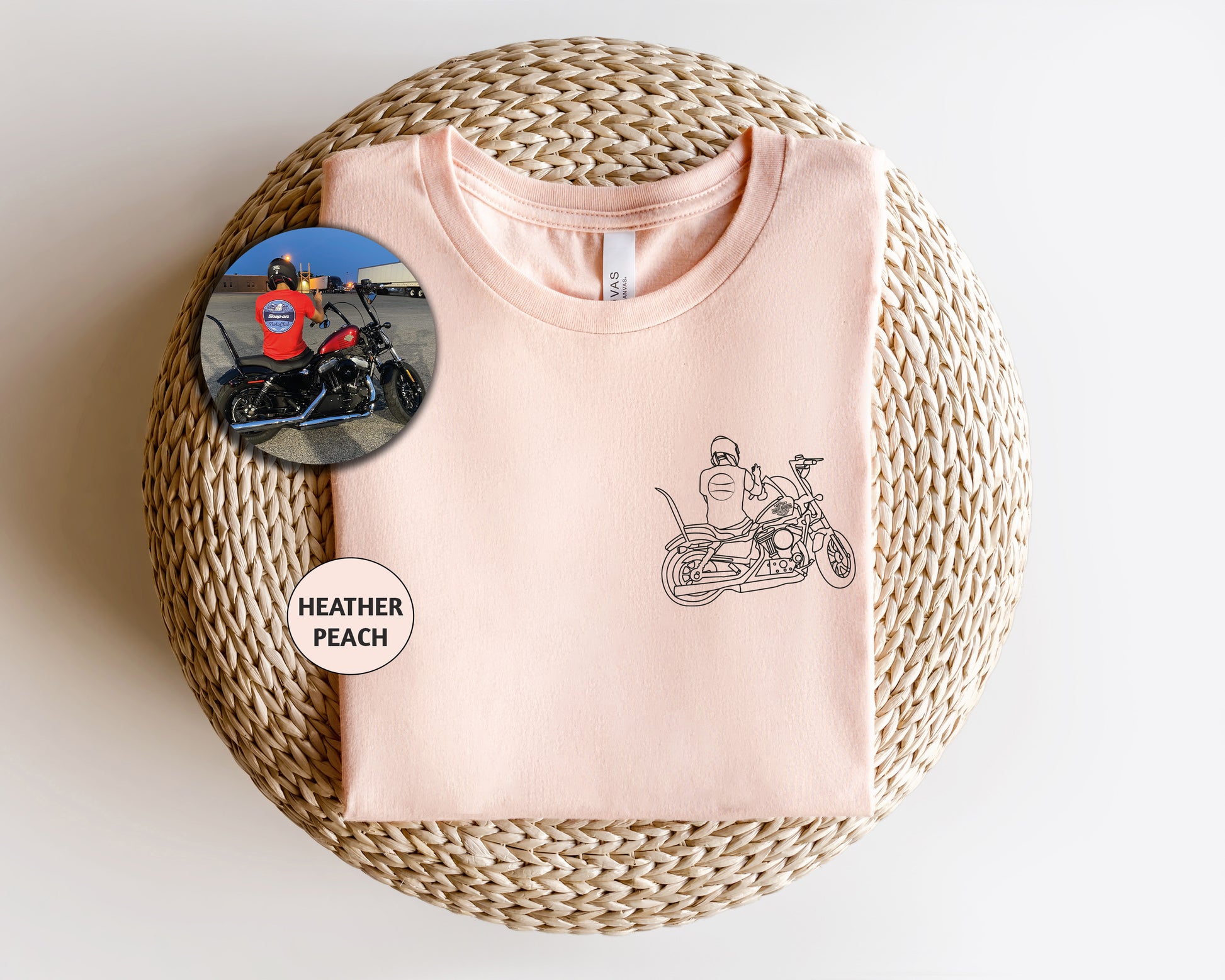 a pink shirt with a picture of a motorcycle on it