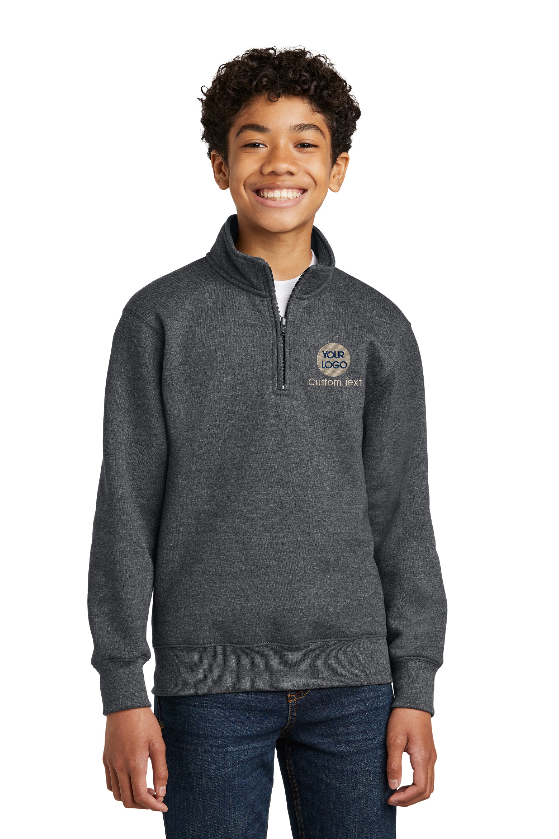 a young boy wearing a gray sweatshirt and smiling