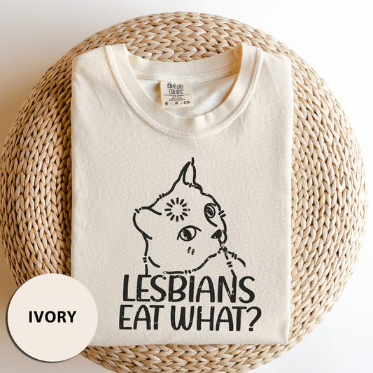 a t - shirt with a picture of a cat saying lesbians eat what?