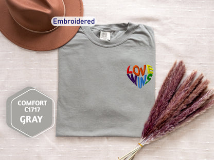 a t - shirt with the words love is printed on it