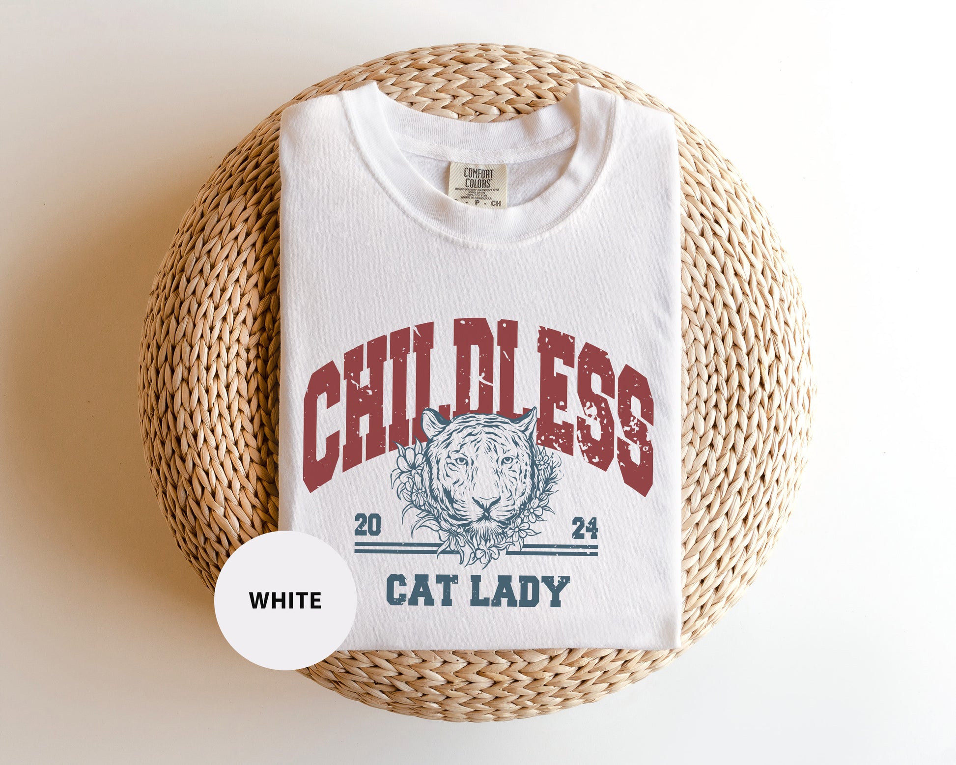 a white t - shirt with a cat lady on it