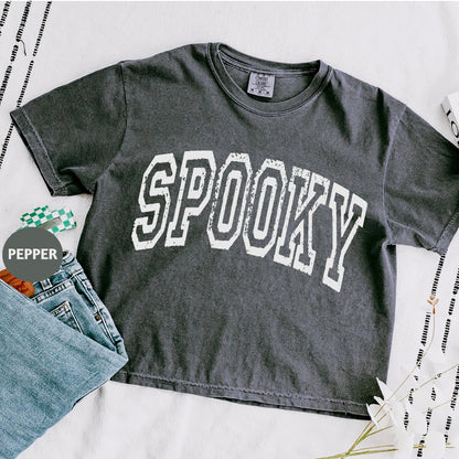 a t - shirt that says spooky on it