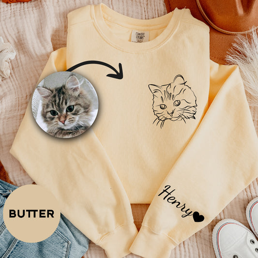 a sweater with a picture of a cat on it