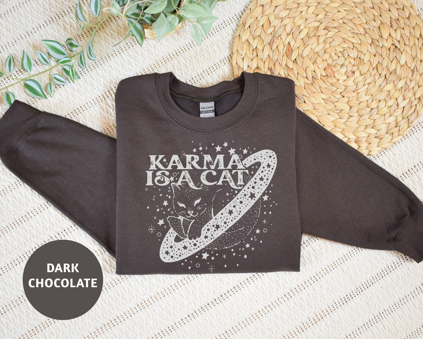 a t - shirt that says karma is a cat on it