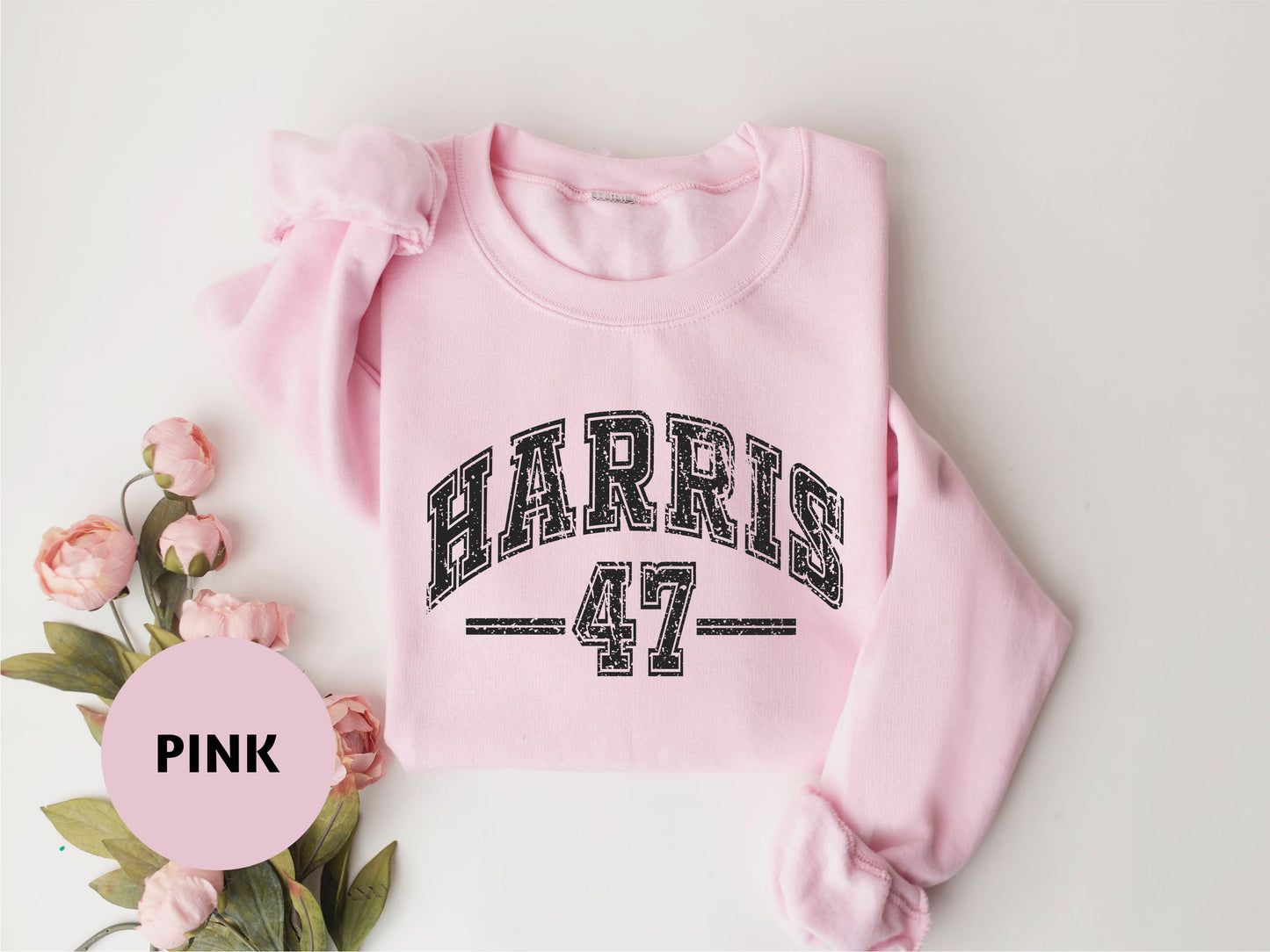 a pink sweatshirt with the name harris on it