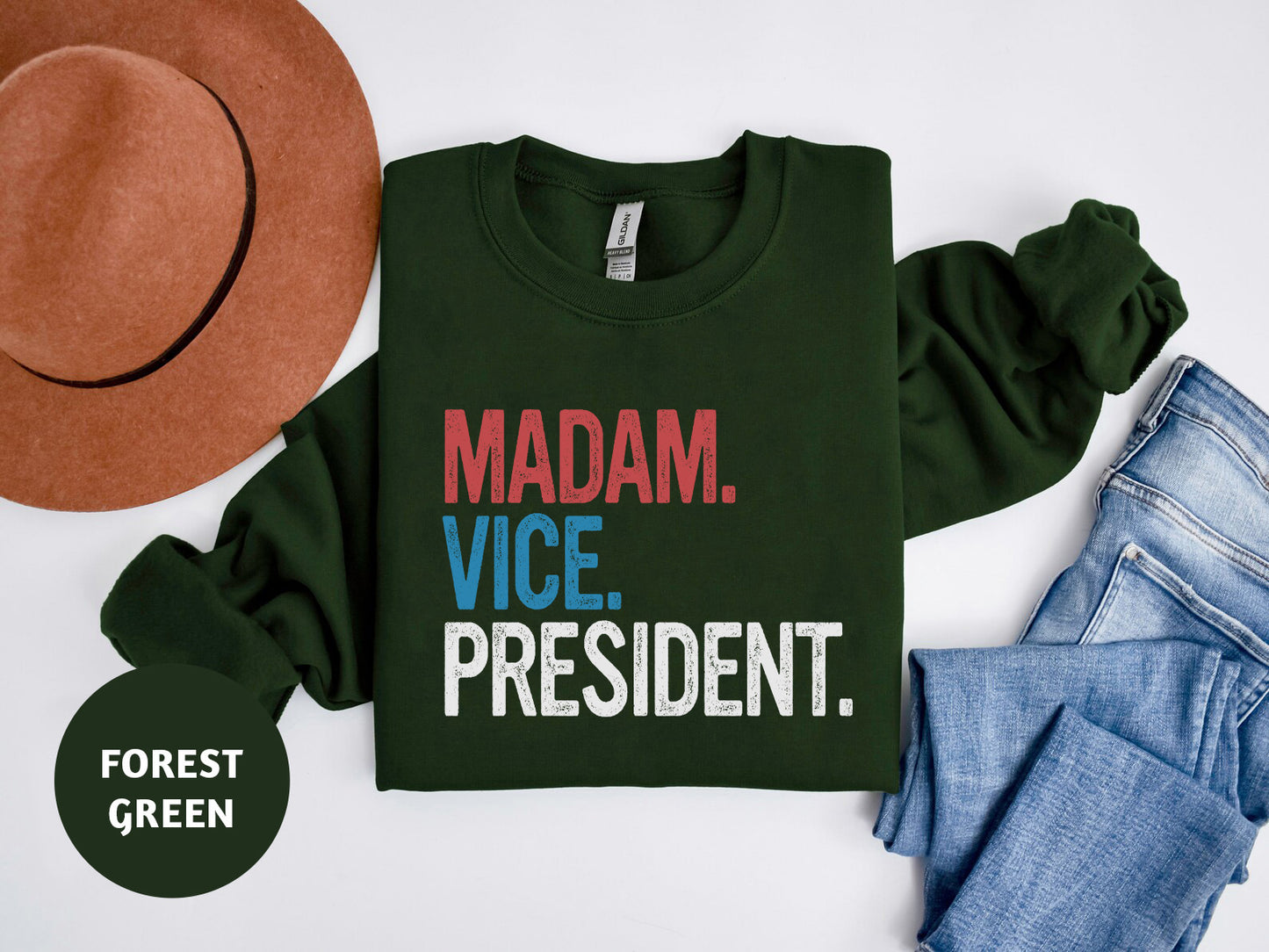 a green shirt with the slogan madam vice president