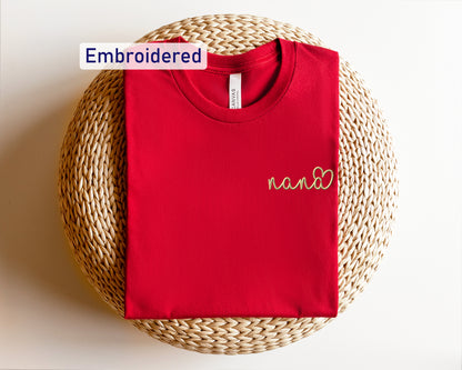 a red t - shirt with a name tag on it