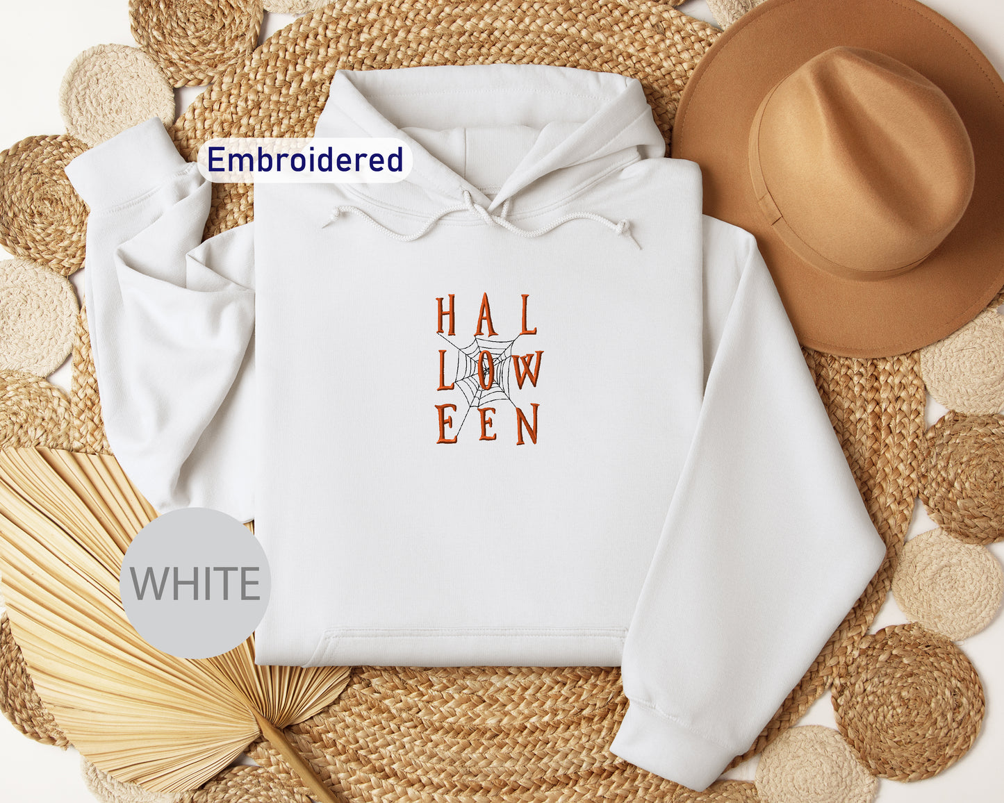 a white hoodie with the words hall low een printed on it