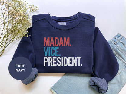 a blue sweatshirt with the words madam vice president on it