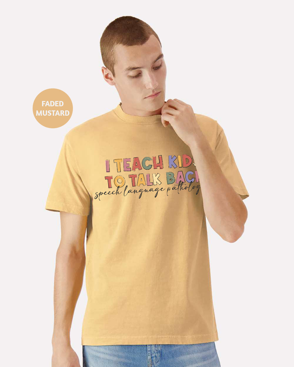 a young man wearing a yellow t - shirt with the words teach kids to talk