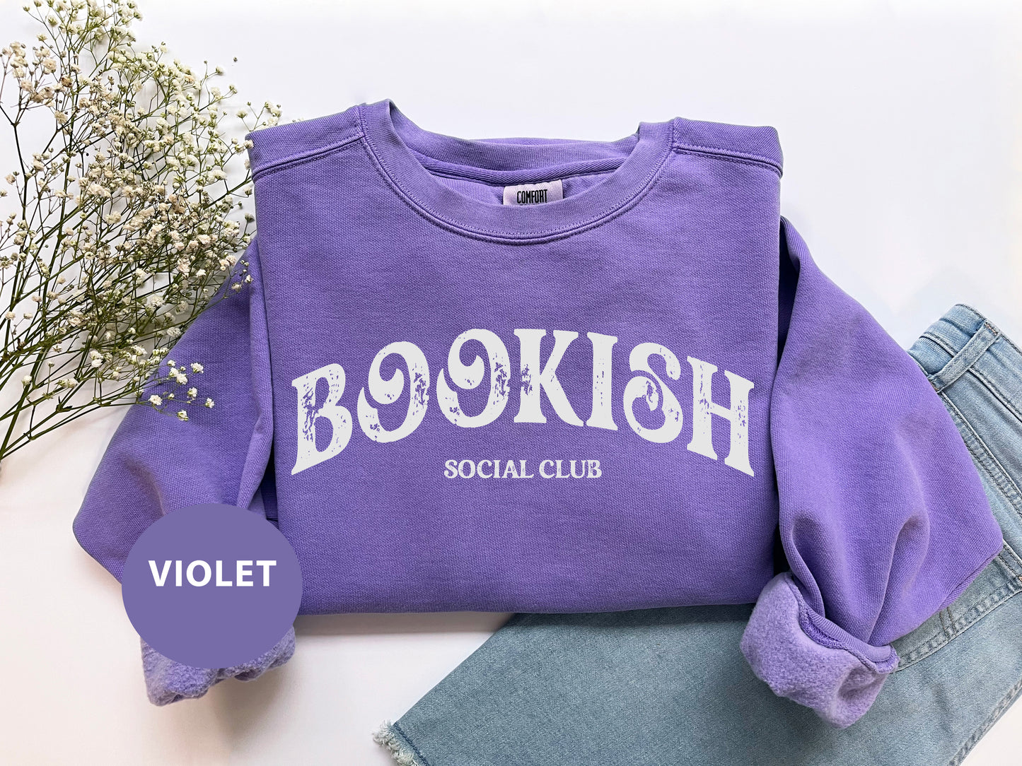 a purple shirt with the words bookish on it