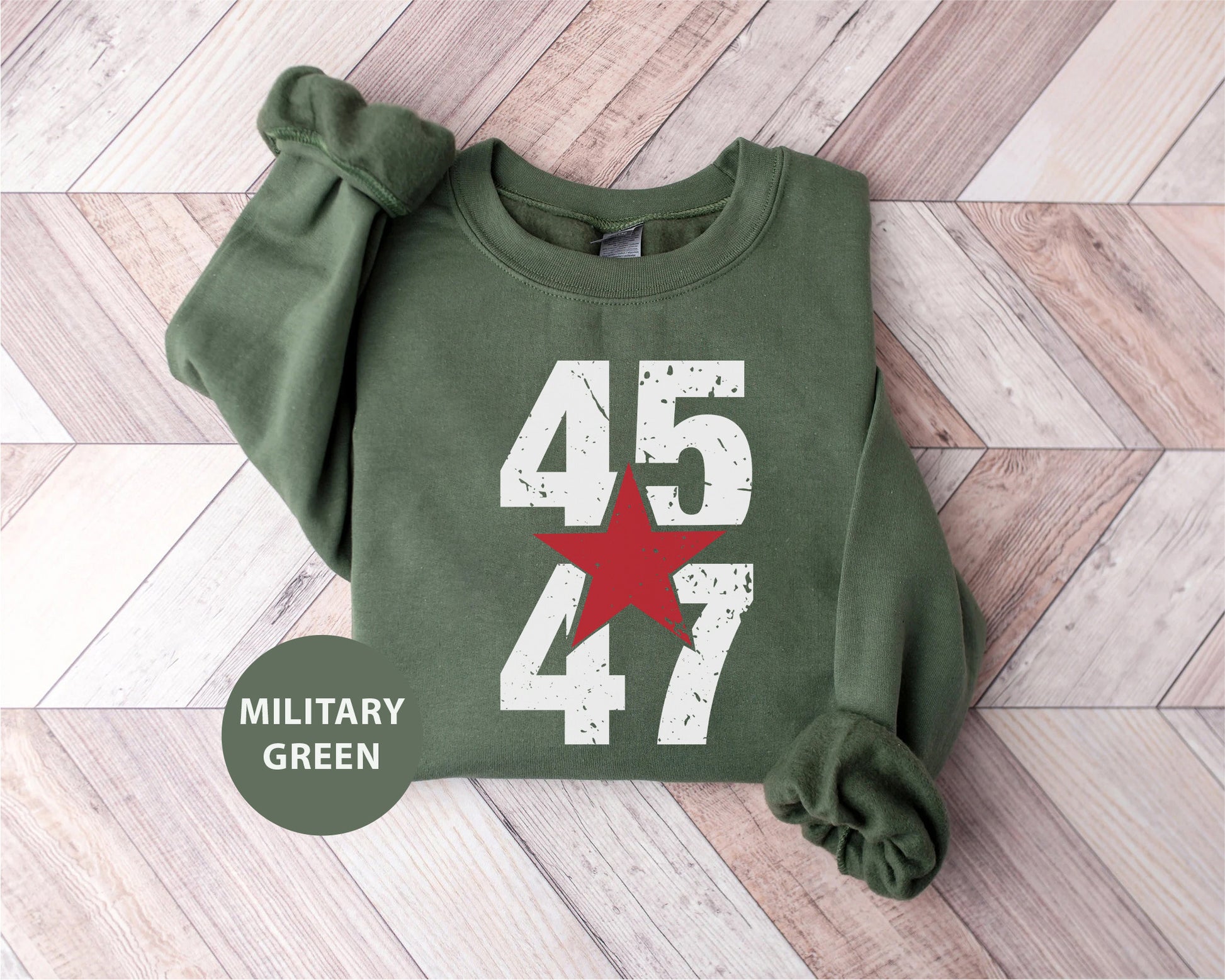 a green sweatshirt with a red star on it