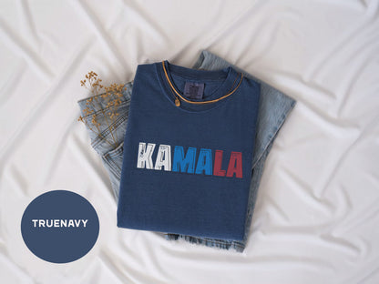 a t - shirt with the word karma printed on it next to a pair of