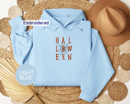 a light blue hoodie with the words hal low een printed on it