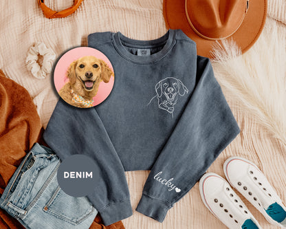 a dog is wearing a sweater with a picture of a dog on it