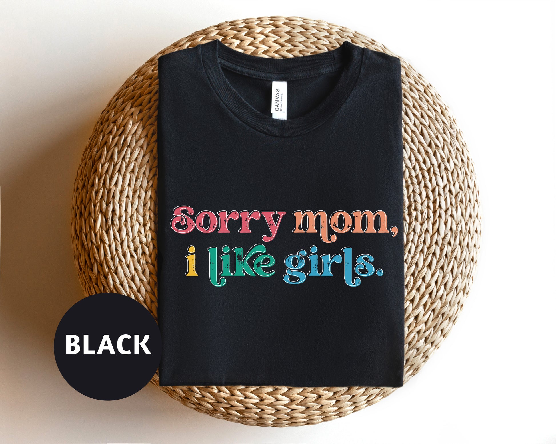 a black t - shirt that says sorry mom i like girls